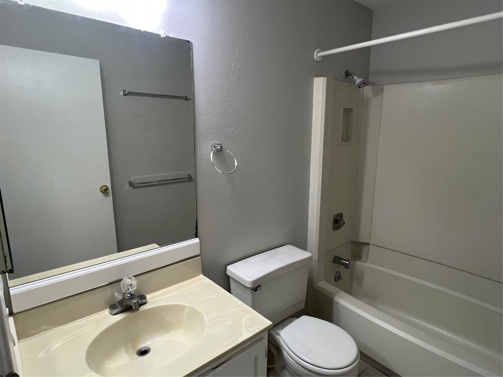 65 Yewleaf Road The Woodlands, TX 77381 - Photo 17 of 21 a bathroom with a sink toilet and shower