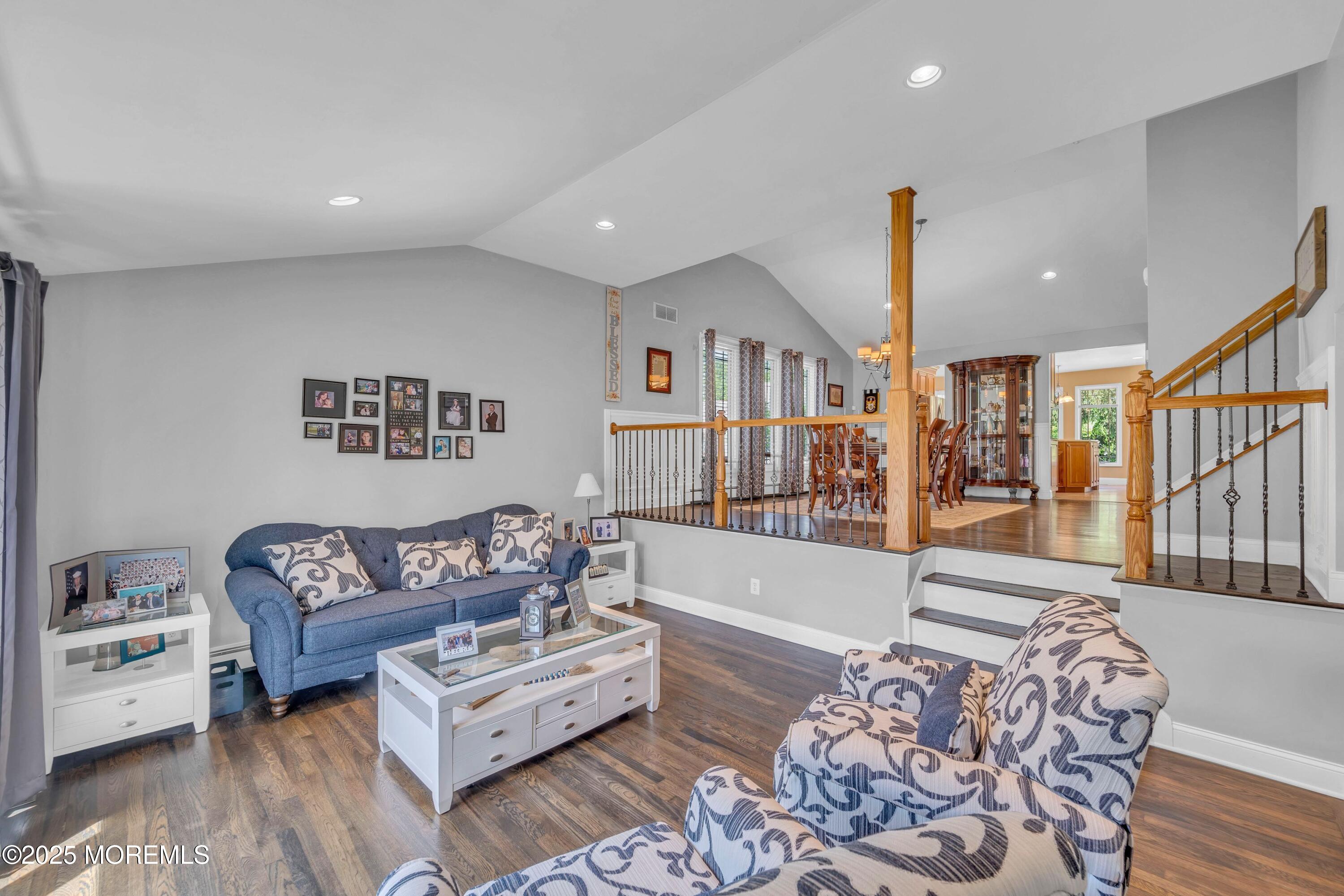 255 Harmony Road Middletown, NJ 07748 - Photo 8 of 57 a living room with furniture and a wooden floor