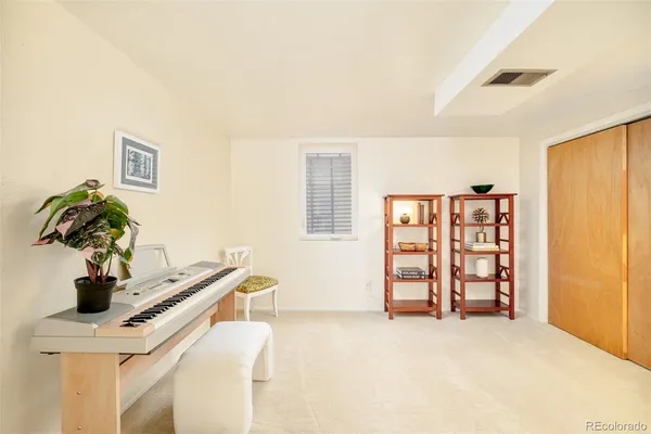 a view of room with window and bathroom