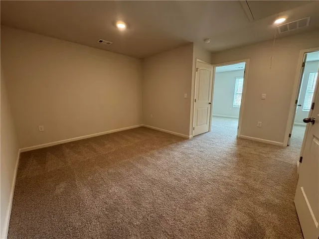 an empty room with a natural light
