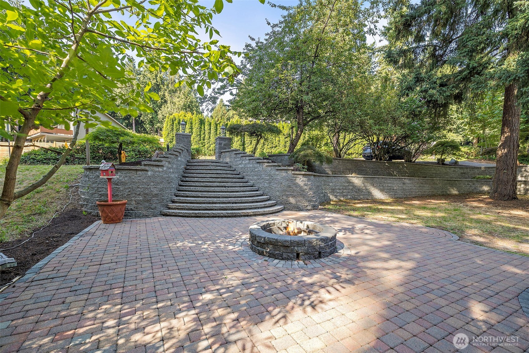 21911 4th Avenue Southeast Bothell, WA 98021 - Photo 2 of 28 a view of a backyard with trees