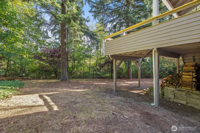 a backyard of a house with portable entertaining space