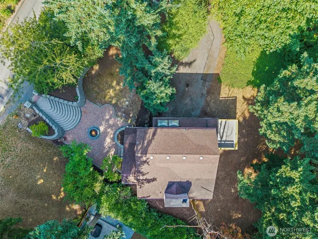 an aerial view of a house with outdoor space