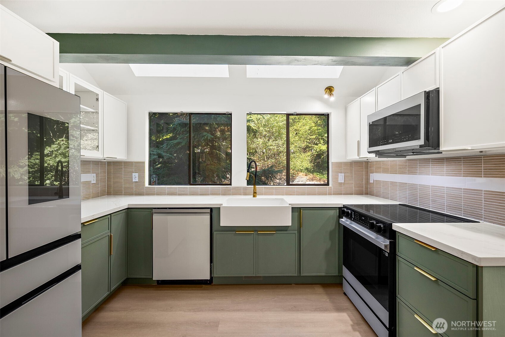 21911 4th Avenue Southeast Bothell, WA 98021 - Photo 10 of 28 a kitchen with a sink and a stove top oven