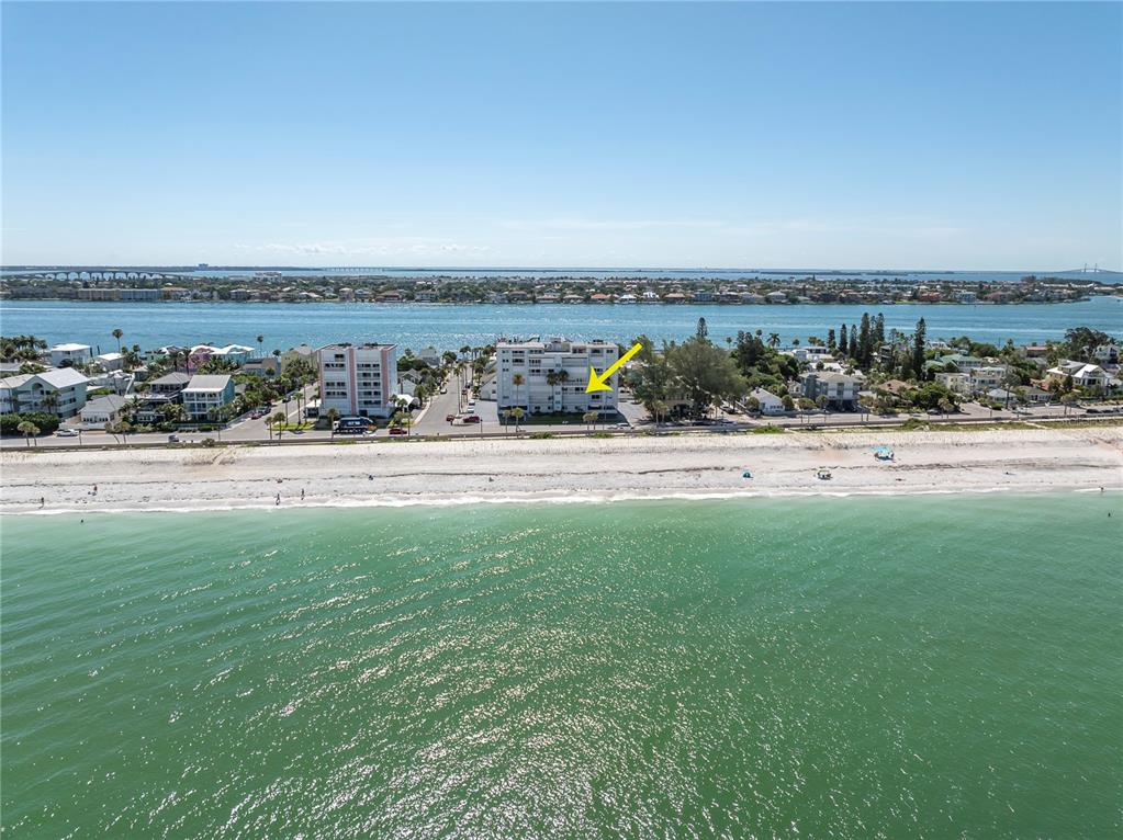 403 Gulf Way, Unit 302 St. Pete Beach, FL 33706 - Photo 22 of 30 a view of a field with an ocean view
