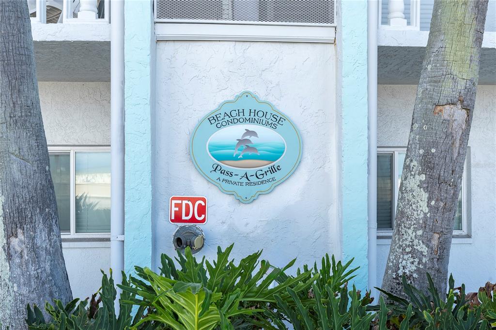 403 Gulf Way, Unit 302 St. Pete Beach, FL 33706 - Photo 28 of 30 a sign that is on a door of a building