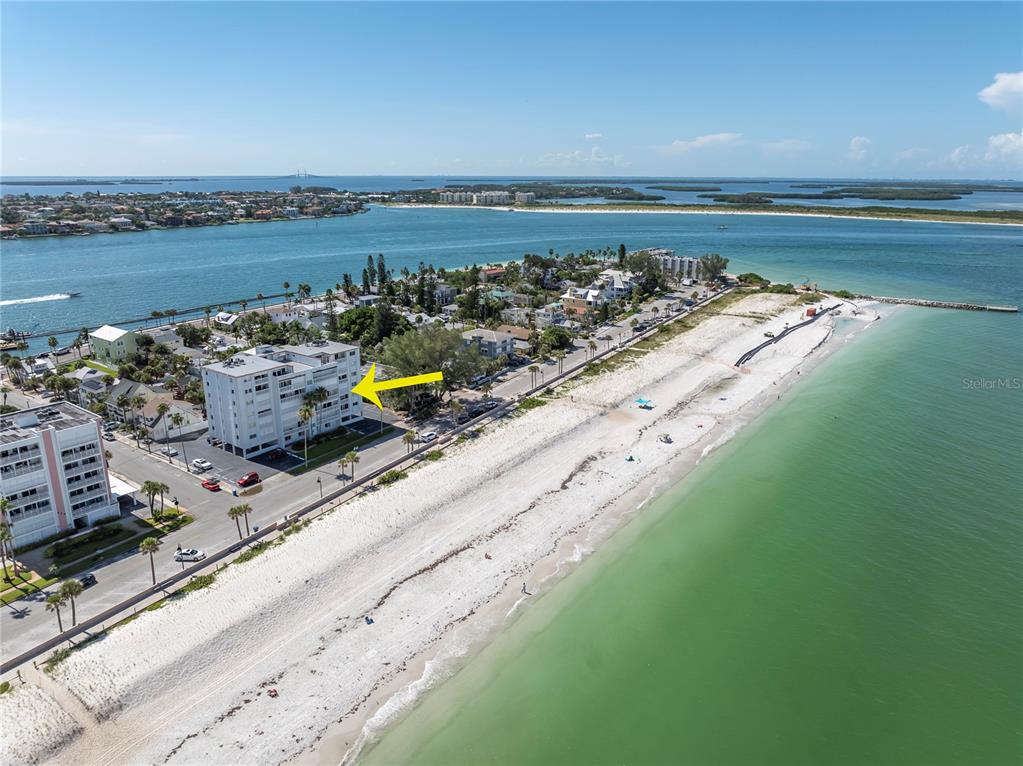 403 Gulf Way, Unit 302 St. Pete Beach, FL 33706 - Photo 3 of 30 a view of a lake with a mountain