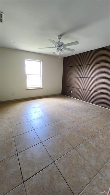 1500 Humming Bird Court, Unit 22 Pharr, TX 78577 - Photo 12 of 15 a view of an empty room with a window