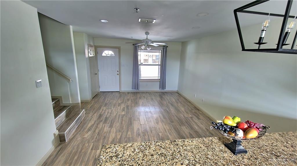 1500 Humming Bird Court, Unit 22 Pharr, TX 78577 - Photo 3 of 15 a view of entryway with wooden floor
