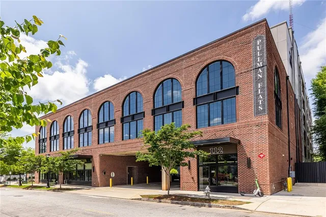 a front view of a building with street view