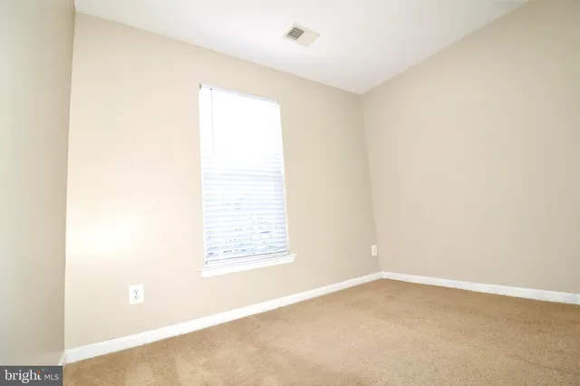 a view of a deck with a backyard