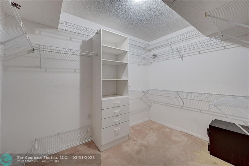 9599 Weldon Circle, Unit A101 Tamarac, FL 33321 - Photo 23 of 28 a view of walk in closet