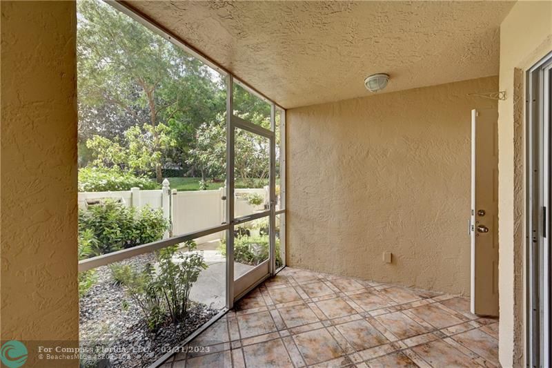 9599 Weldon Circle, Unit A101 Tamarac, FL 33321 - Photo 25 of 28 a view of a porch