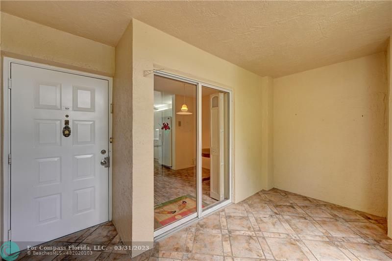 9599 Weldon Circle, Unit A101 Tamarac, FL 33321 - Photo 3 of 28 a view of a bathroom with shower