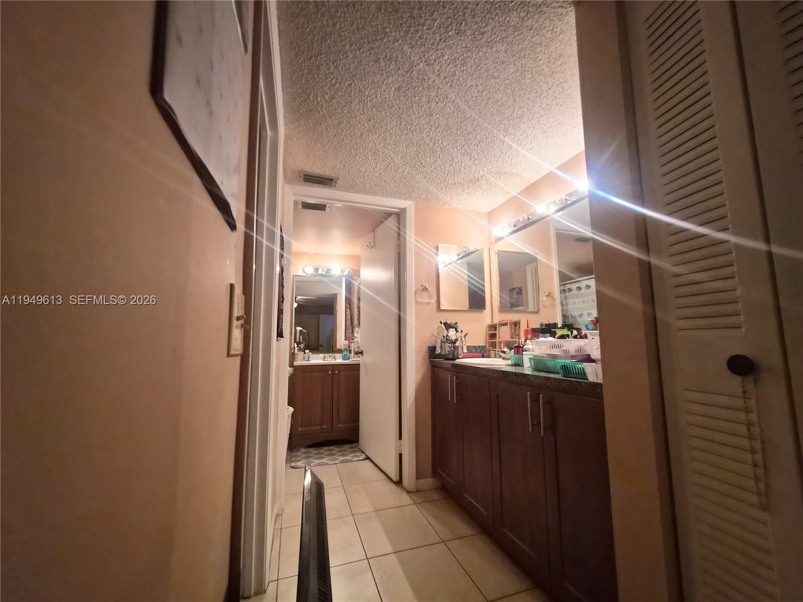 800 Independence Drive, Unit 800F Homestead, FL 33034 - Photo 12 of 26 a view of a living room with a wooden floor