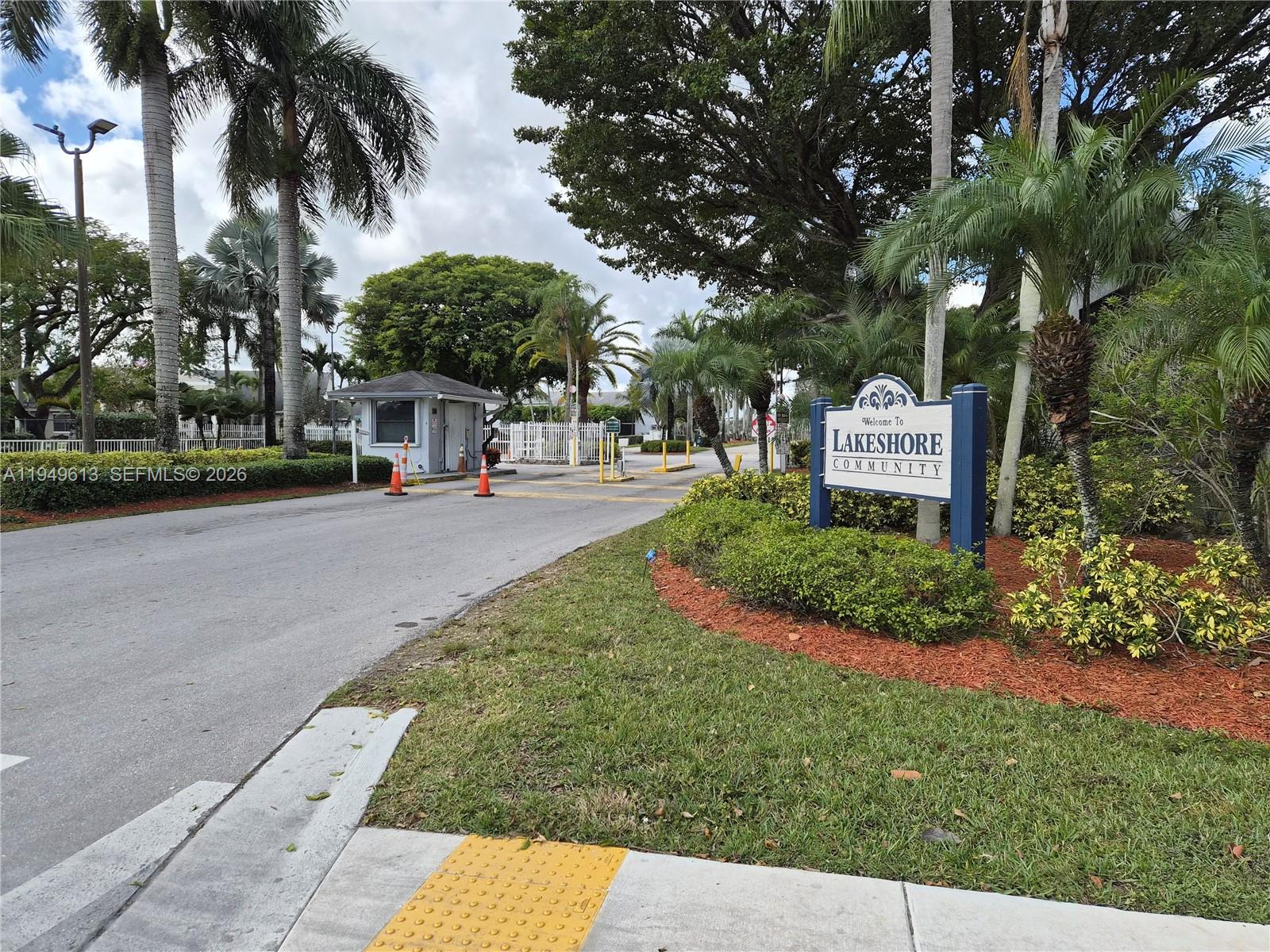 800 Independence Drive, Unit 800F Homestead, FL 33034 - Photo 22 of 26 a view of a street with a building and trees