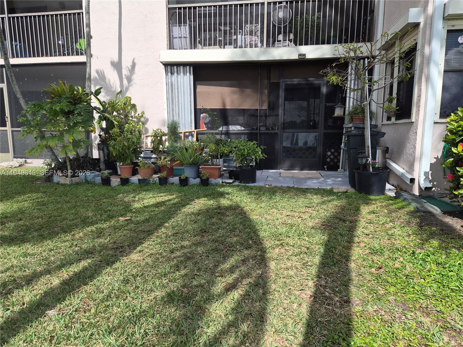 800 Independence Drive, Unit 800F Homestead, FL 33034 - Photo 26 of 26 a view of house with yard outdoor seating and entertaining space