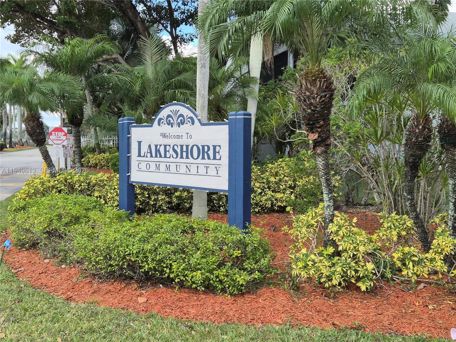 800 Independence Drive, Unit 800F Homestead, FL 33034 - Photo 5 of 26 a sign that is sitting in front of flowers