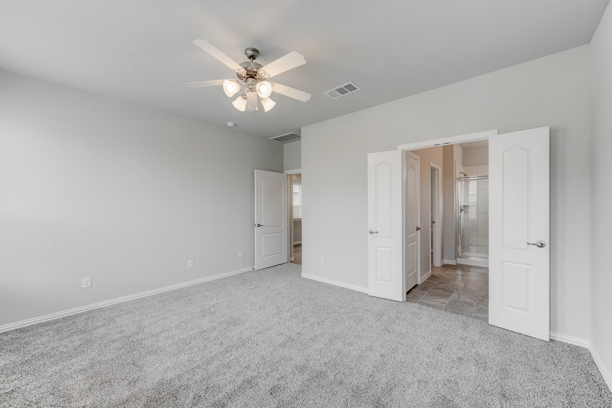 1229 Red Hills Drive Rosharon, TX 77583 - Photo 14 of 29 a view of an empty room and chandelier fan