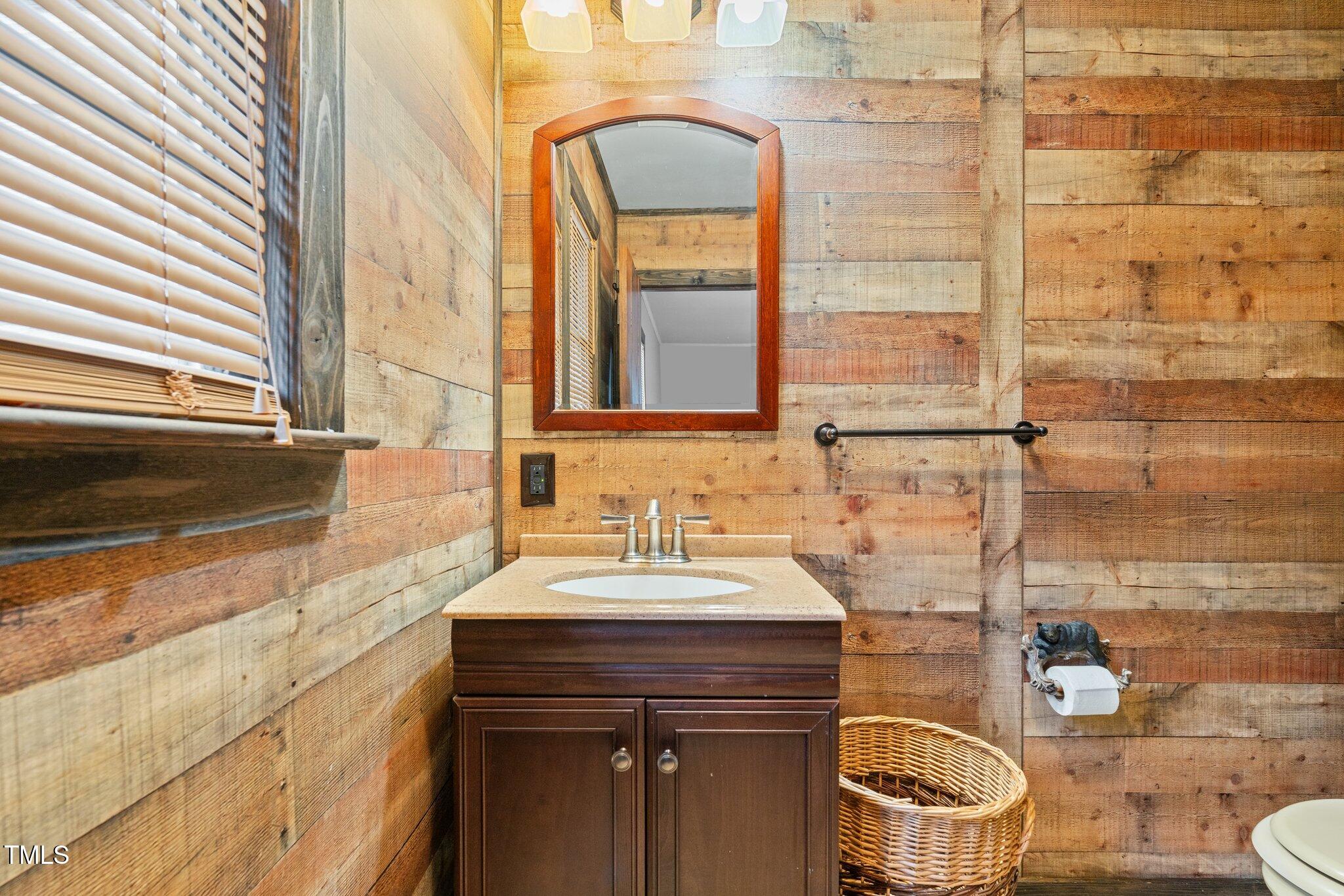 578 Marler Road Benson, NC 27504 - Photo 14 of 55 a bathroom with a sink and a mirror