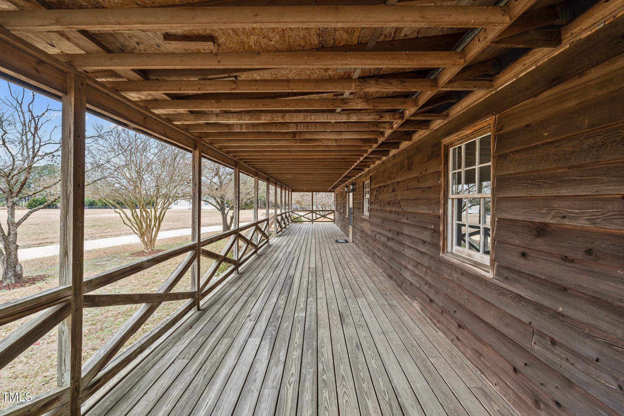 578 Marler Road Benson, NC 27504 - Photo 54 of 55 a view of a balcony with wooden floor