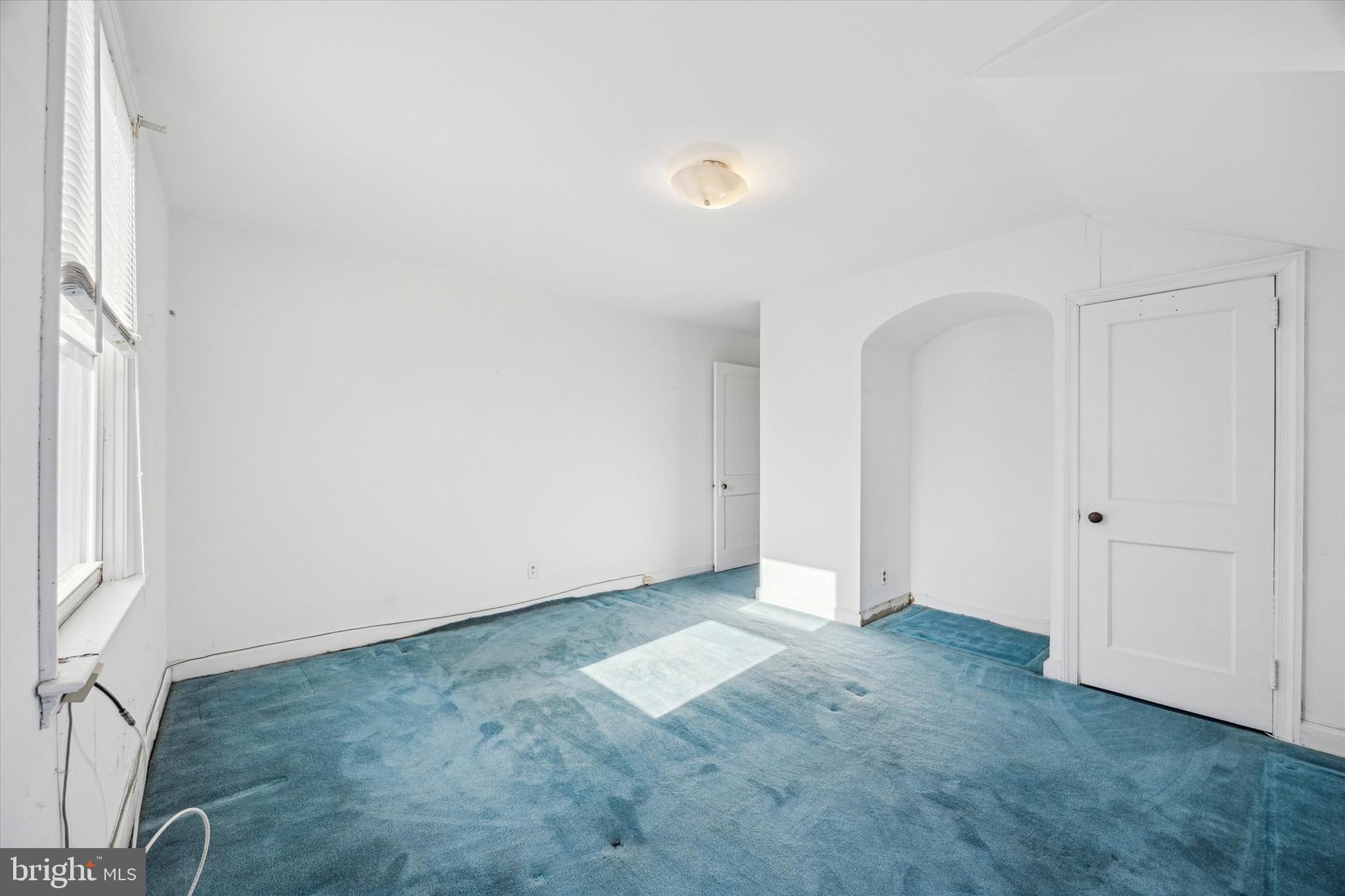 2044 Jenkintown Road Glenside, PA 19038 - Photo 22 of 33 an empty room with a natural light