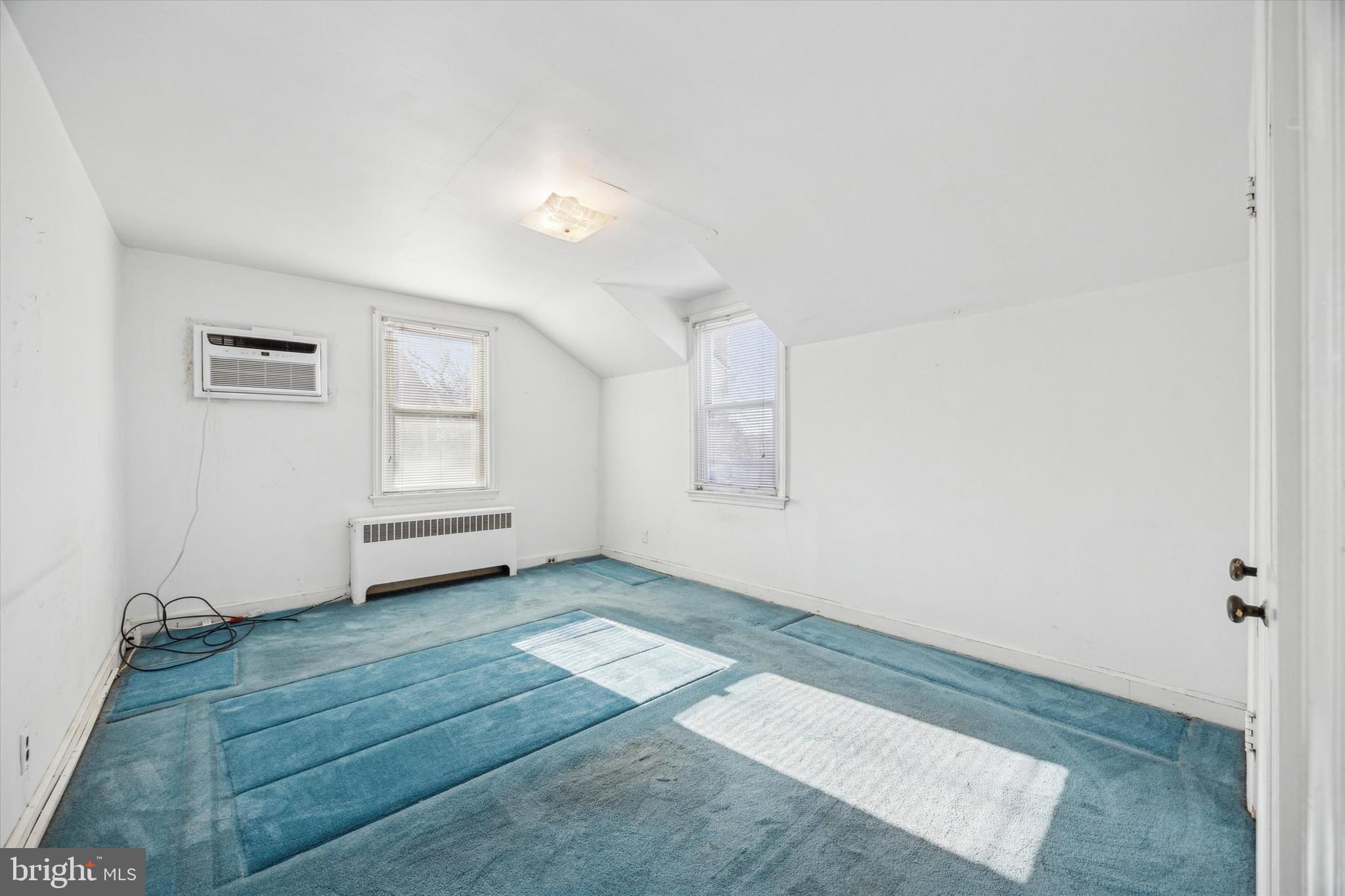 2044 Jenkintown Road Glenside, PA 19038 - Photo 23 of 33 an empty room with windows