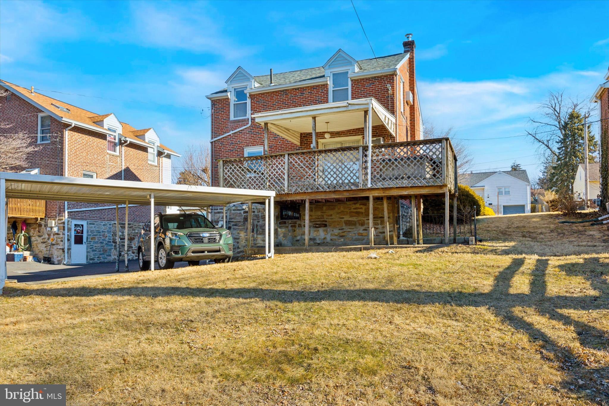2044 Jenkintown Road Glenside, PA 19038 - Photo 3 of 33 a front view of a building with a garden