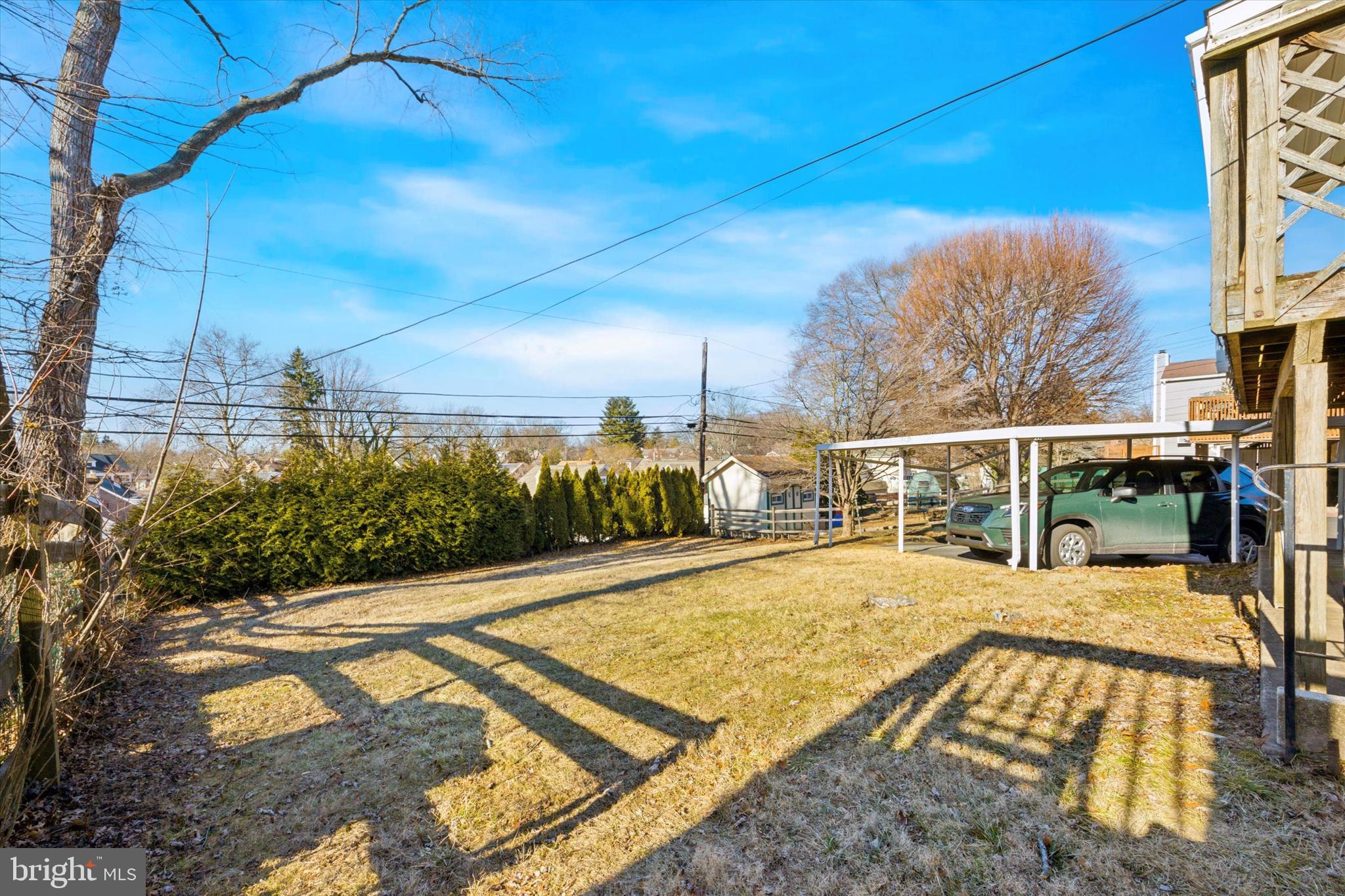 2044 Jenkintown Road Glenside, PA 19038 - Photo 4 of 33 a view of a swimming pool with an outdoor space and seating area
