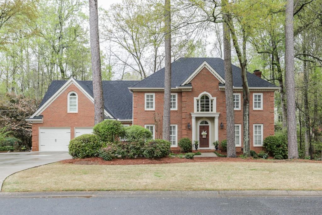 660 Gunby Rd- Three sides brick and back is cement siding. Wonderful renovation in popular Sibley Forest neighborhood with swim/tennis/pool/playground and access to Sope Creek bike and walking trails.