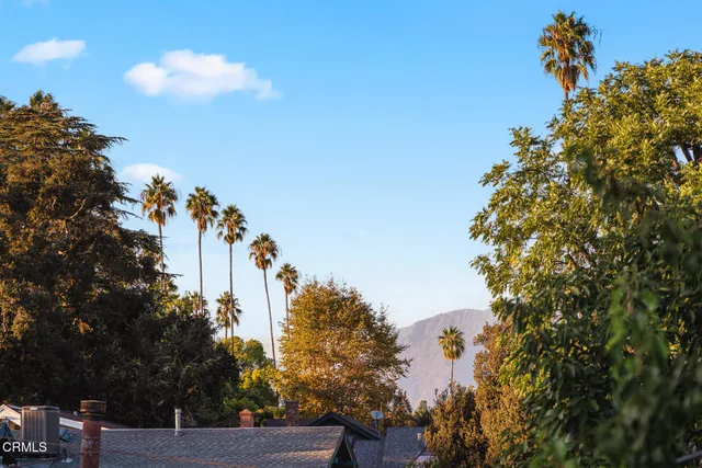 a view of a building with a street