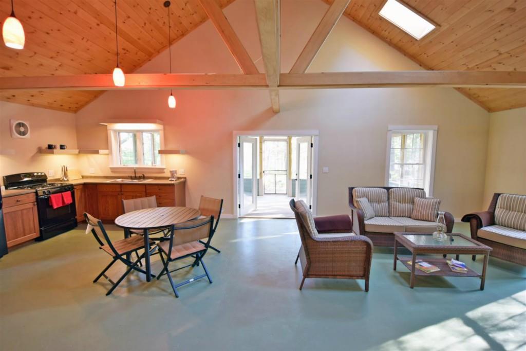 213 Tannery Brook Road Ellsworth, ME 04605 - Photo 11 of 35 Dramatic wood ceiling with wood beams.