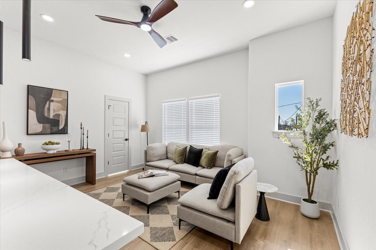 9821 Turnbow Street, Unit CD Houston, TX 77029 - Photo 11 of 27 Livingroom lots of natural lighting (staged photos of 9819 Turnbow B)