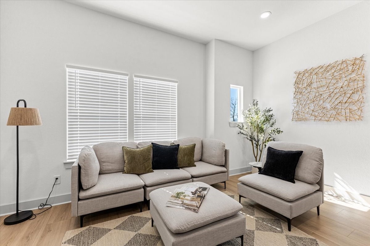 9821 Turnbow Street, Unit CD Houston, TX 77029 - Photo 12 of 27 Livingroom lots of natural lighting (staged photos of 9819 Turnbow B)