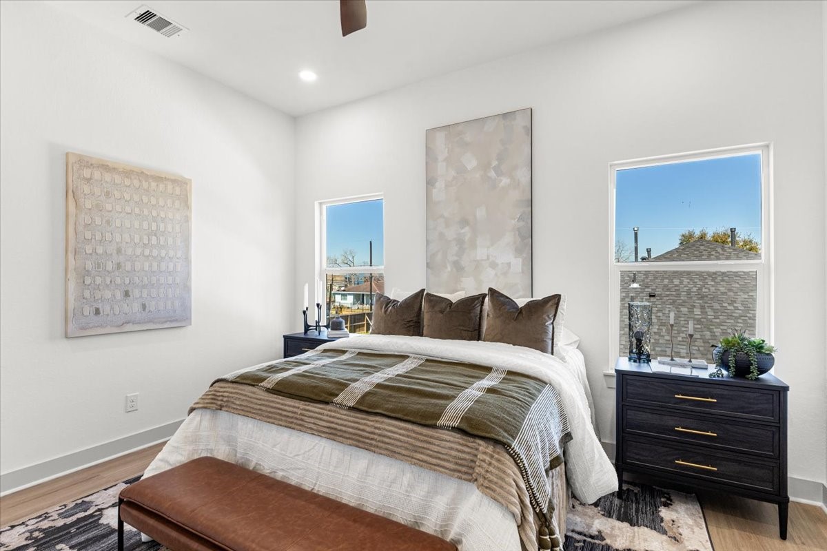 9821 Turnbow Street, Unit CD Houston, TX 77029 - Photo 17 of 27 Primary bedroom (staged photos of 9819 Turnbow Unit B)