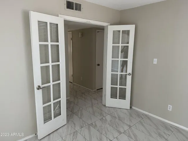 an empty room with windows