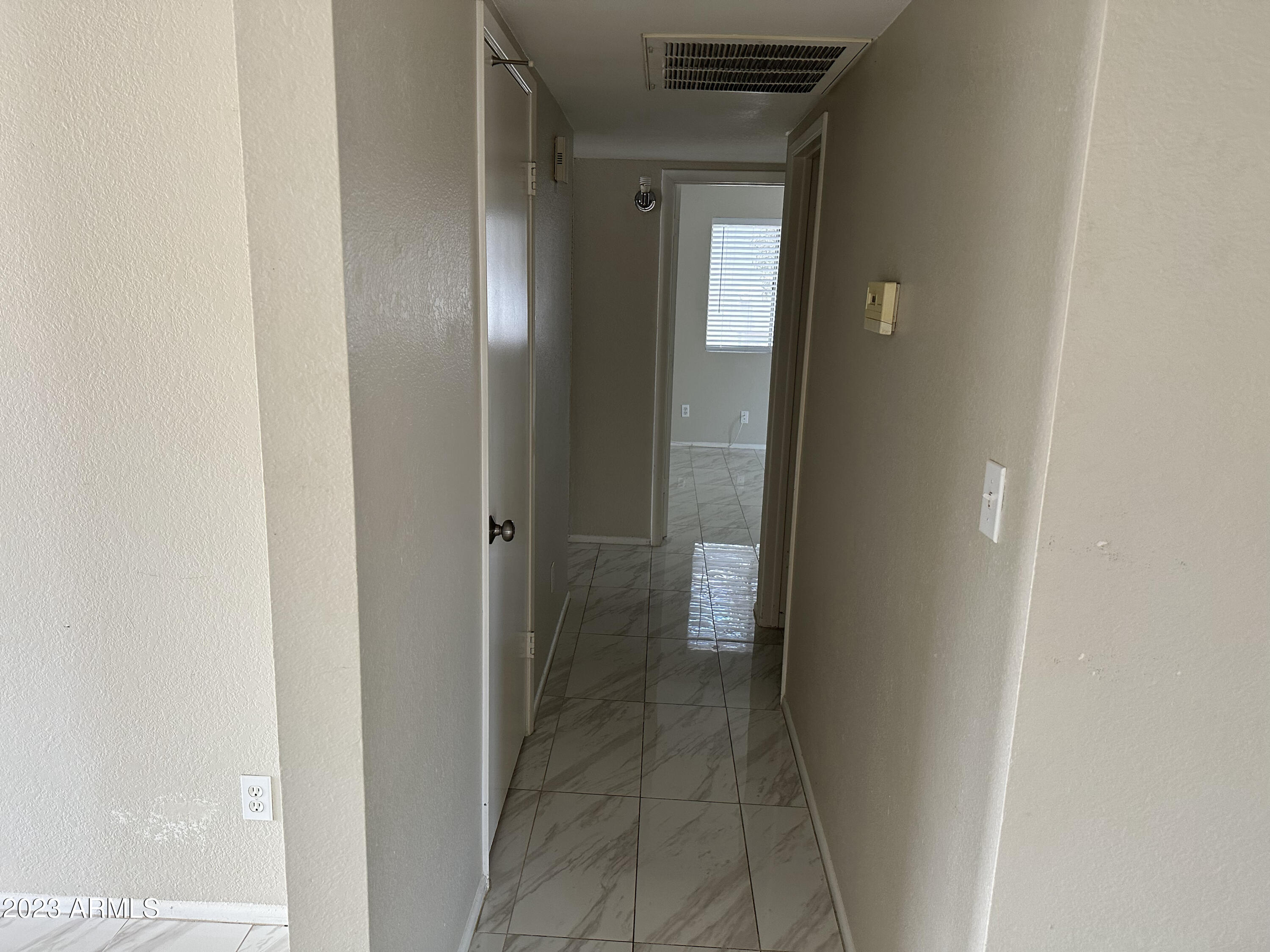 2536 East Commonwealth Circle Chandler, AZ 85225 - Photo 27 of 34 a view of a bathroom from a hallway