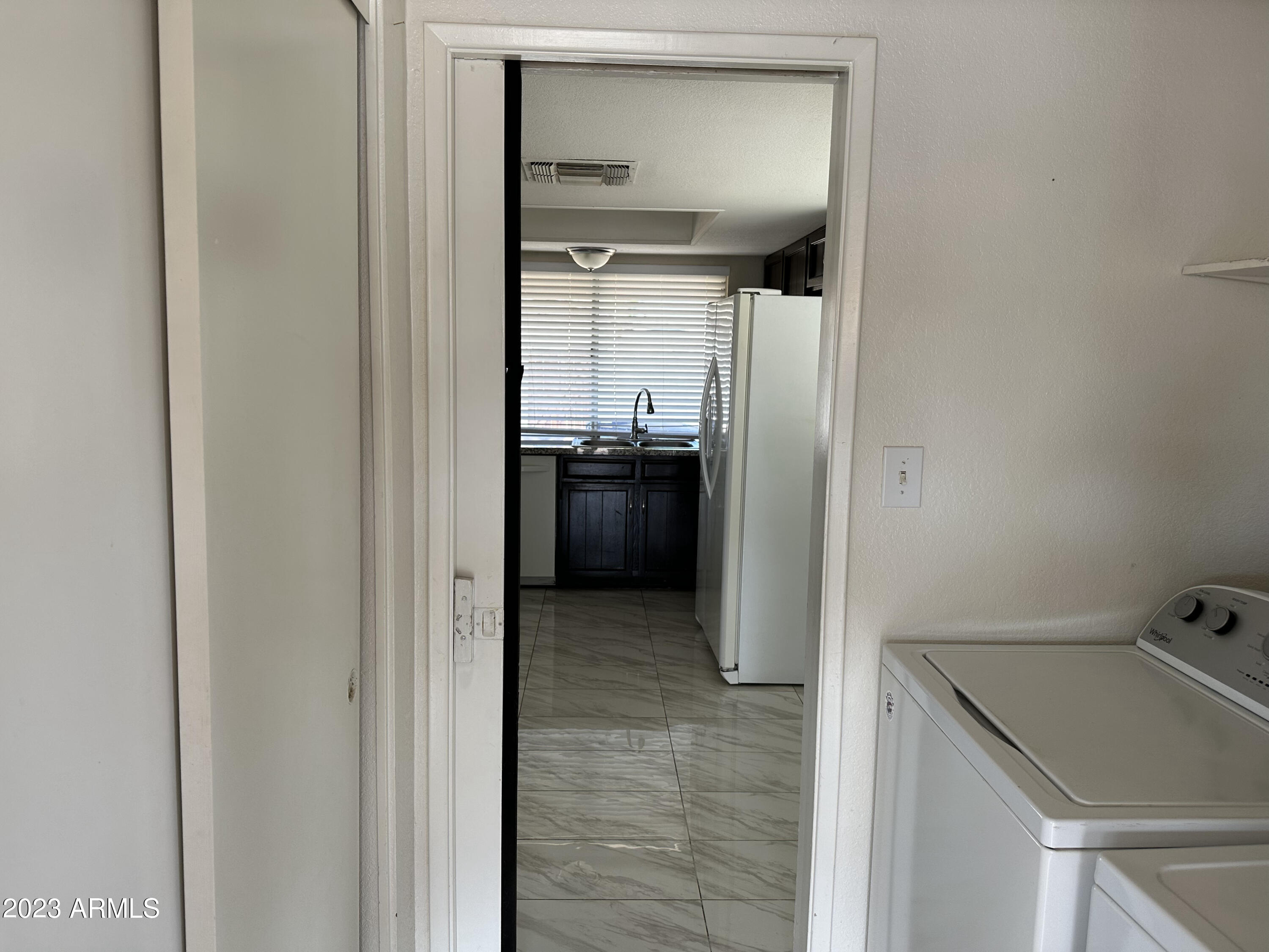 2536 East Commonwealth Circle Chandler, AZ 85225 - Photo 33 of 34 a bathroom with a sink and mirror
