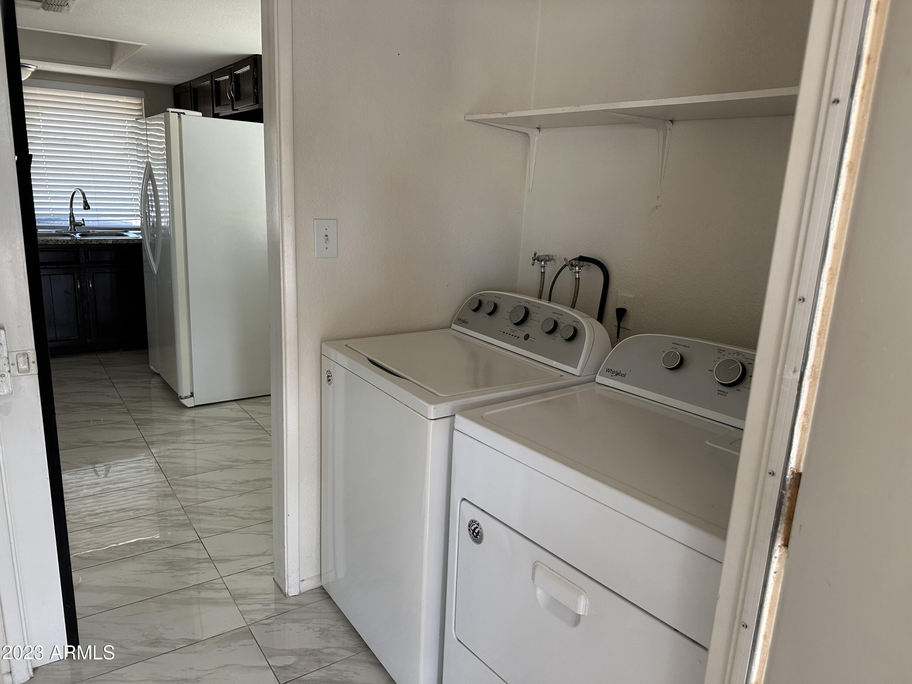 2536 East Commonwealth Circle Chandler, AZ 85225 - Photo 34 of 34 a utility room with dryer and washer