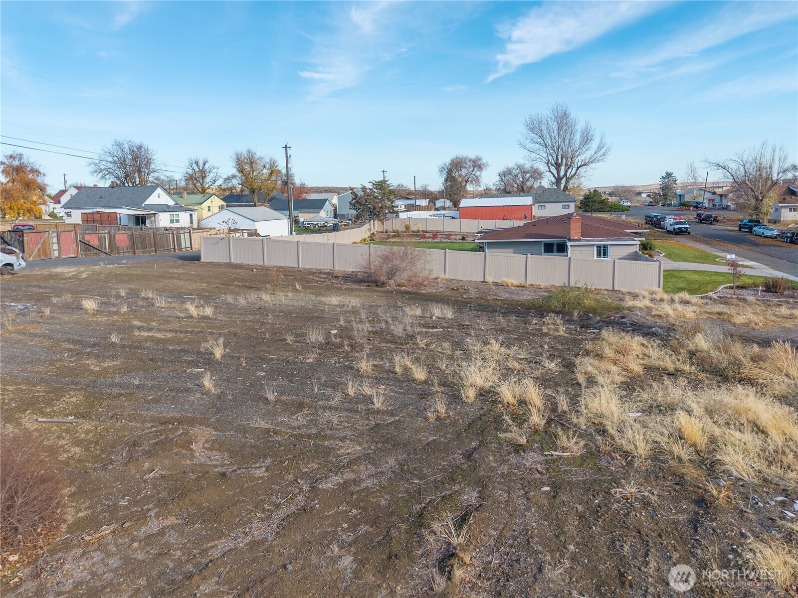 408 North L Street Lind, WA 99341 - Photo 7 of 11 a backyard of a house with table and chairs