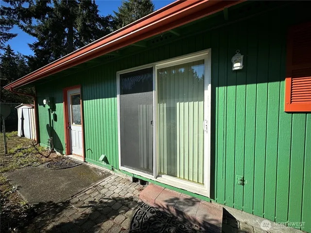 a view of backyard with green space