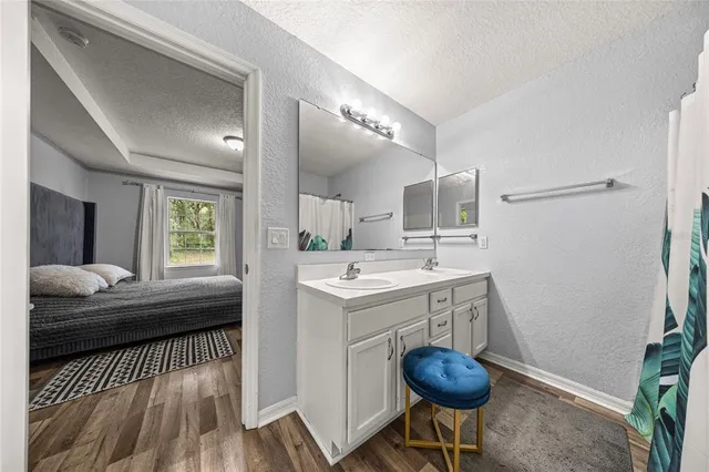 a bathroom with a sink and a bathtub