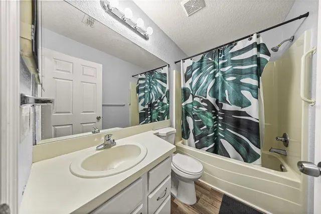 a view of a back yard from a balcony