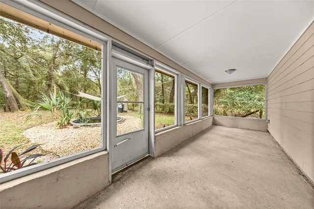 a backyard of a house with lots of green space