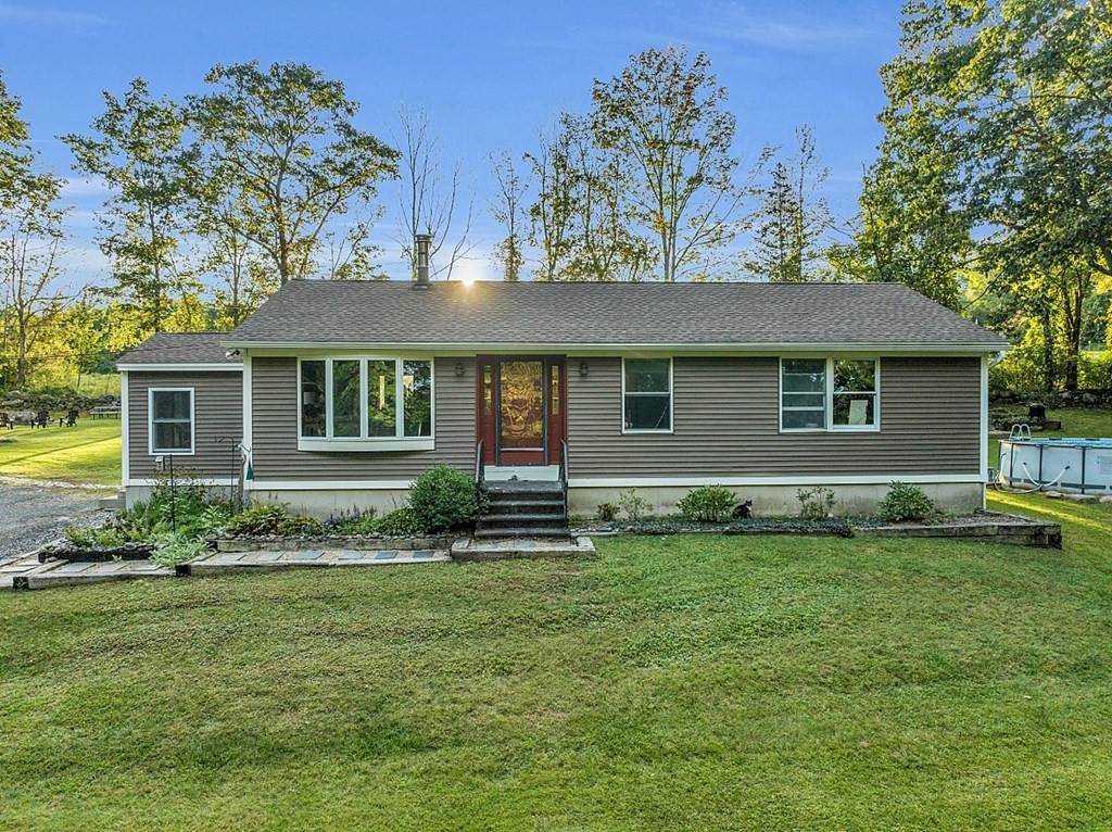 10 Whitney Road Phillipston, MA 01331 - Photo 1 of 41 a front view of a house with a garden