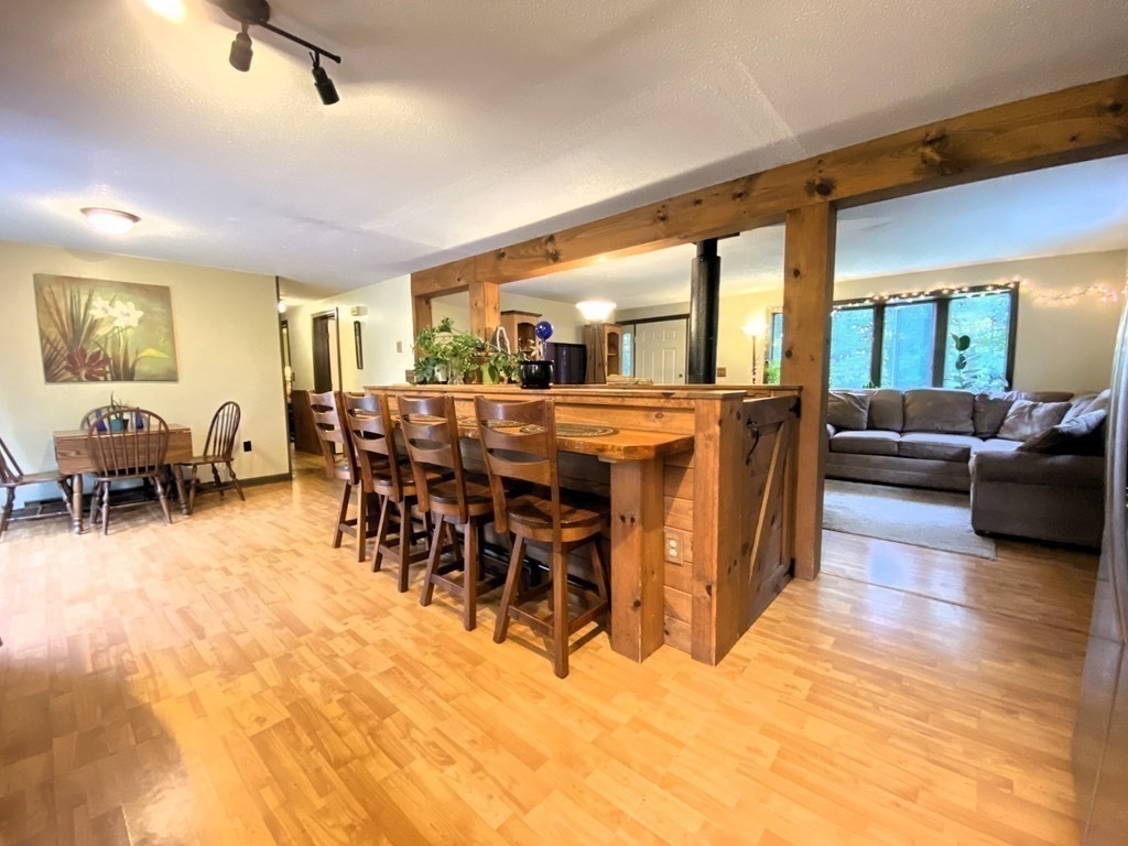 10 Whitney Road Phillipston, MA 01331 - Photo 12 of 41 a view of a dining room with furniture window and wooden floor