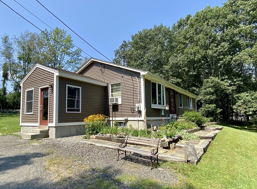 10 Whitney Road Phillipston, MA 01331 - Photo 2 of 41 a front view of house with yard outdoor seating and green space
