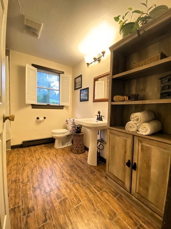 10 Whitney Road Phillipston, MA 01331 - Photo 22 of 41 a living room with a couch and a table
