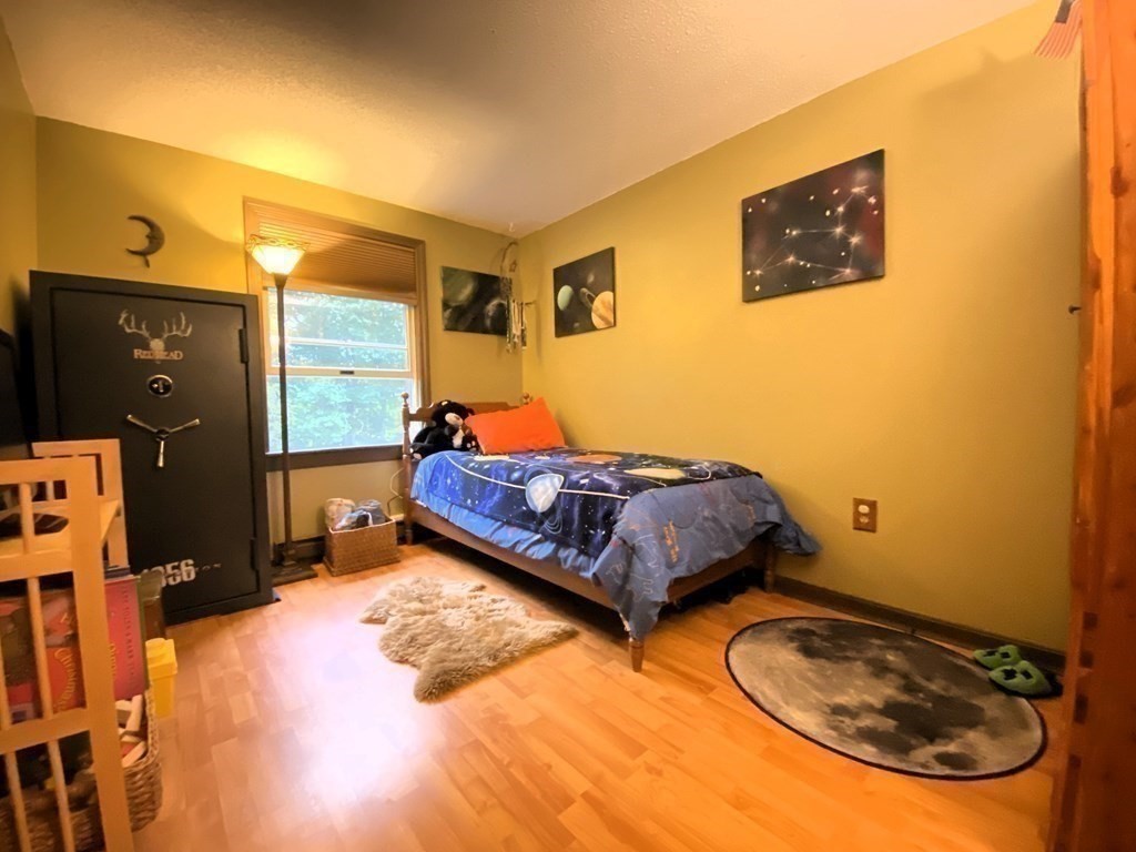 10 Whitney Road Phillipston, MA 01331 - Photo 23 of 41 a bedroom with a bed and dresser