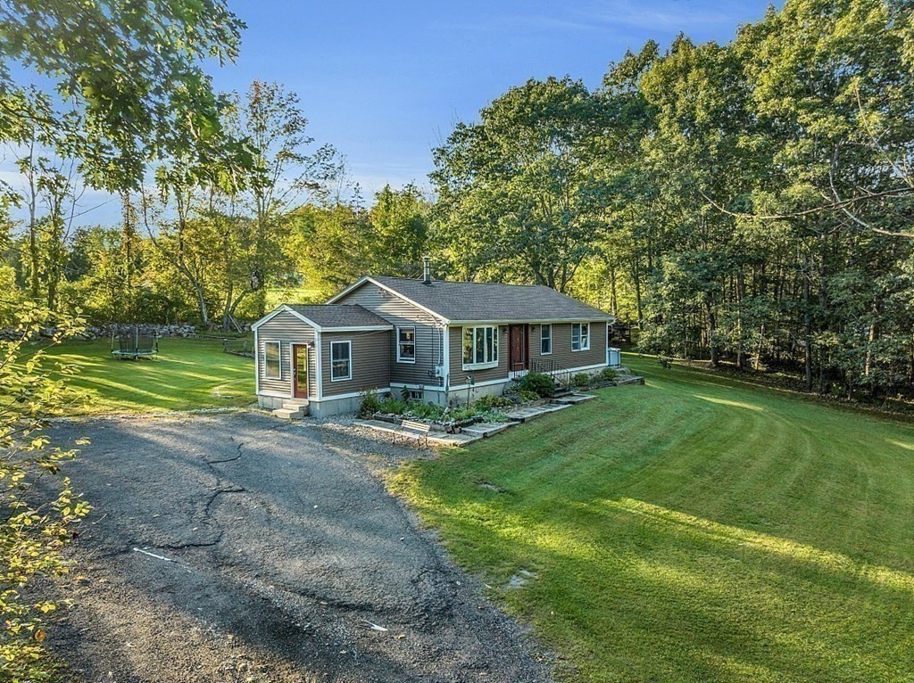 10 Whitney Road Phillipston, MA 01331 - Photo 37 of 41 a front view of a house with yard and green space